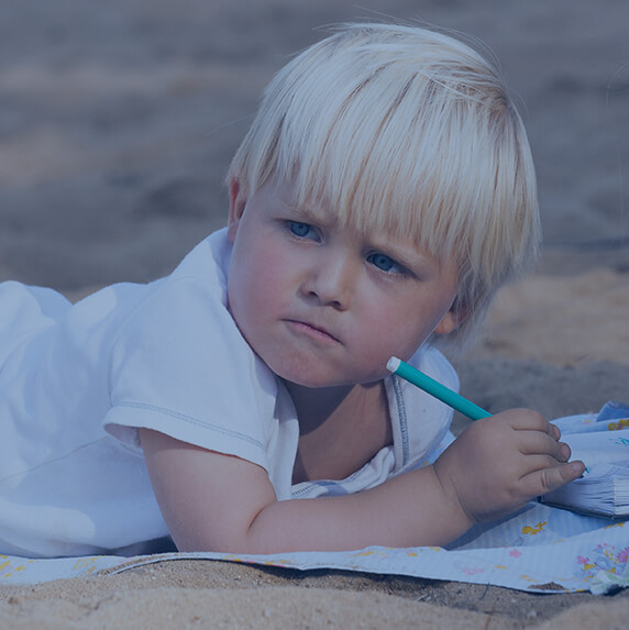 Boy filling out form